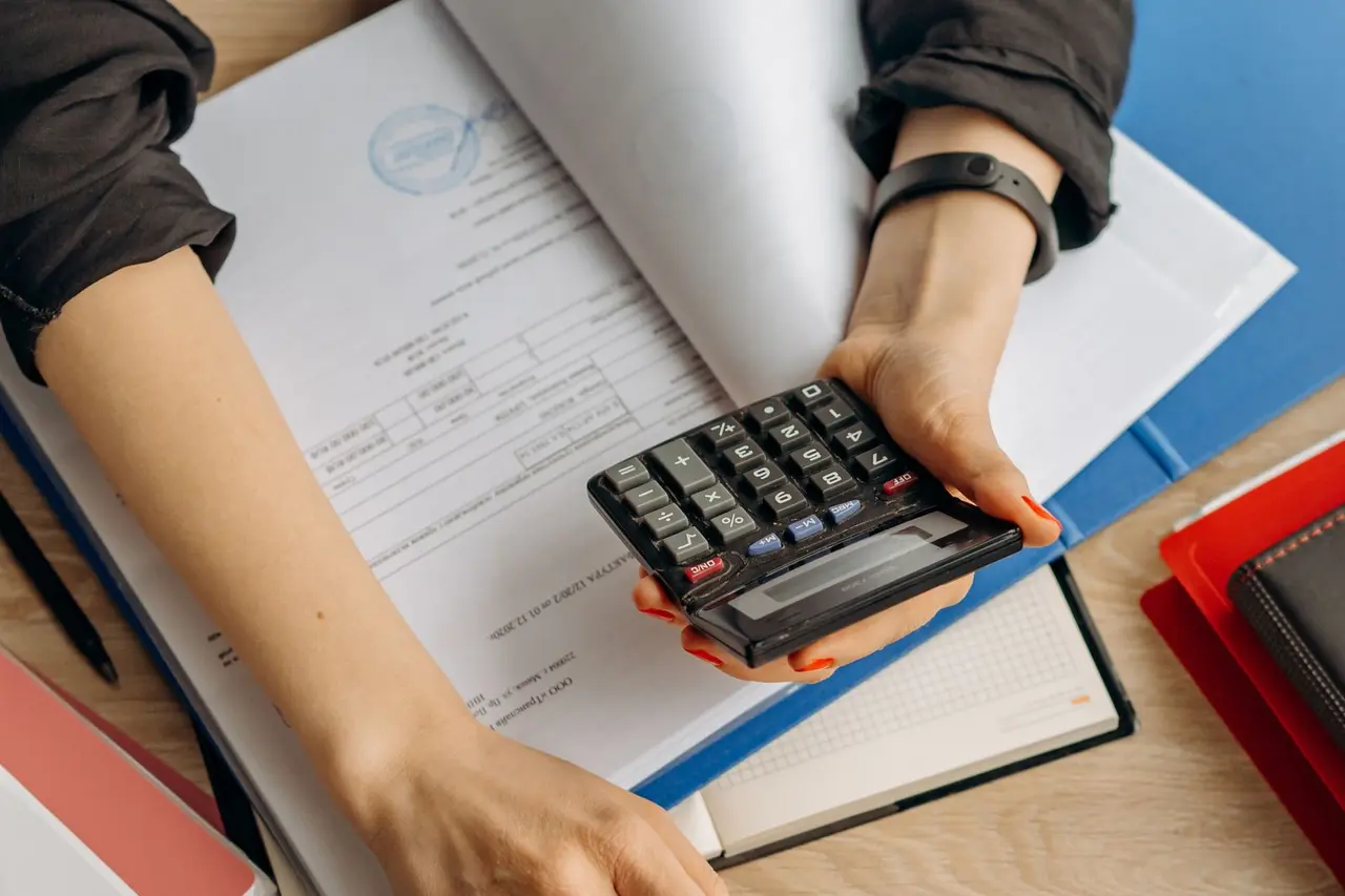 Calculator and project plans used to prepare a contractor estimate